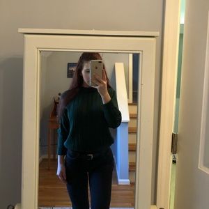 Green turtleneck sweater